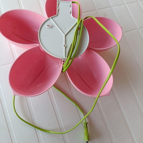 Smila Blomma children's wall light in pink flower shape