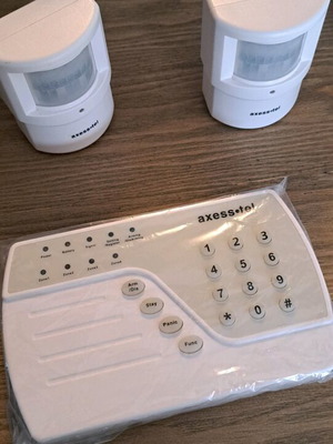 GSM alarm system like new with SIM card and mobile control