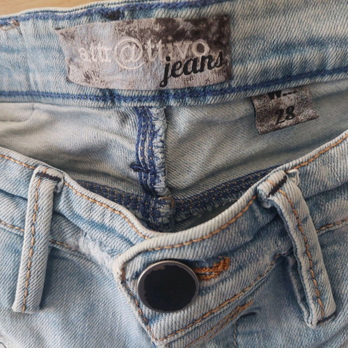 Attrativo light blue jeans with rips used, size 28