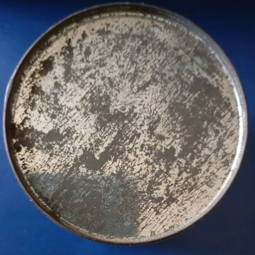 Metal tin used shaped like a bucket with vanilla from Raches Lamias