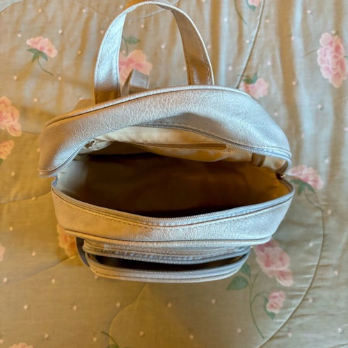 Women's backpack used in light gray color