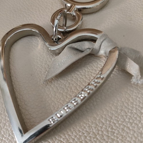 Burberry silver heart bag charm like new