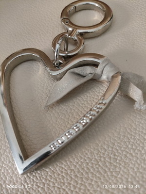 Burberry silver heart bag charm like new