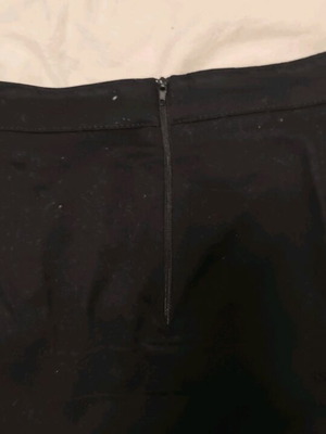 Mini black skirt with gold buttons and crown design, like new, size Large Anel