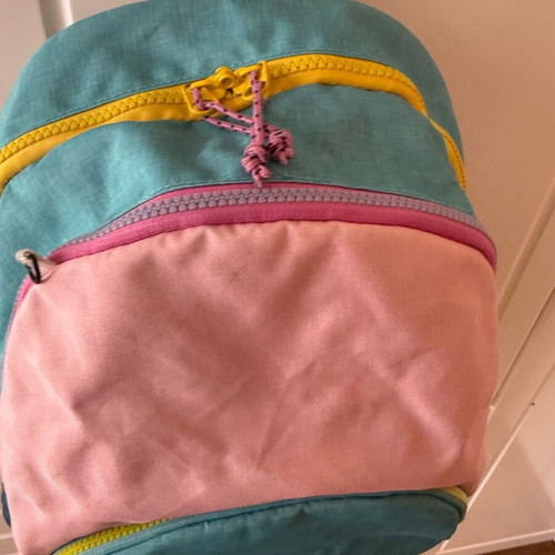 Children's school backpack used with multiple compartments and supportive back