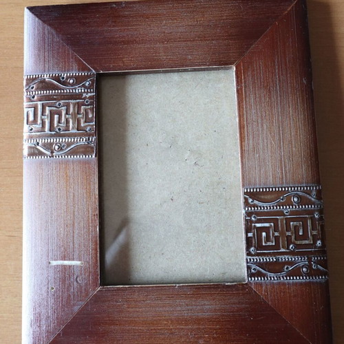 Brown photo frame used with small scratch