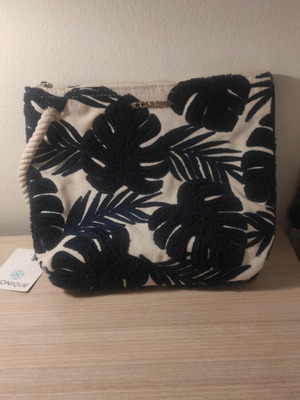 Iconique clutch bag new, white with dark blue leaves