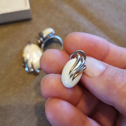 Silver 925 set with white stones used, possibly white coral