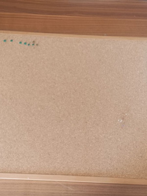 Cork bulletin board with wooden frame and hanging rings