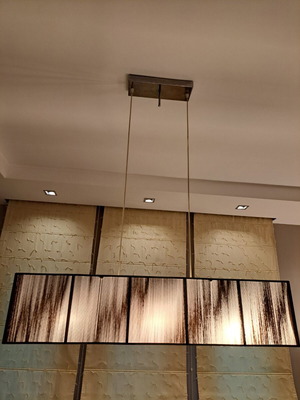 Modern dining light like new with rectangular design