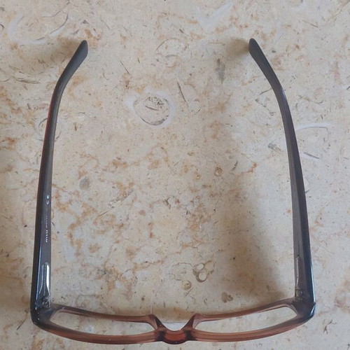 Miu Miu eyeglasses used with purple and orange acetate frame