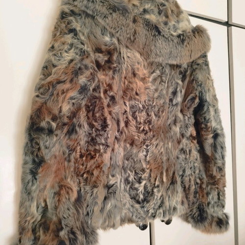 Diversi natural fur size 38 like new