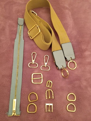 Various bag accessories like new, rings, buckles, strap