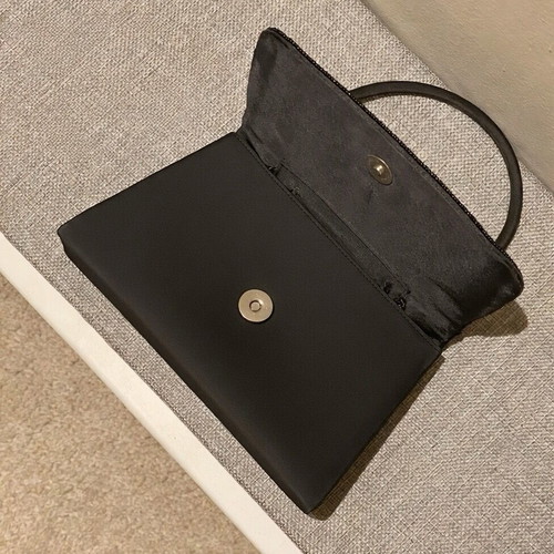 Mini black handbag like new with beaded embossed design