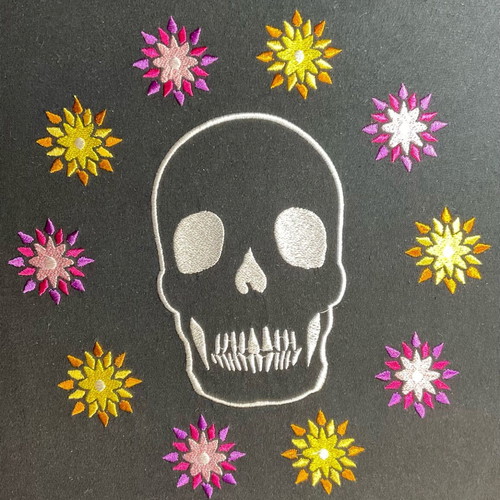 Cotton blouse with embroidered skull and flower design, new