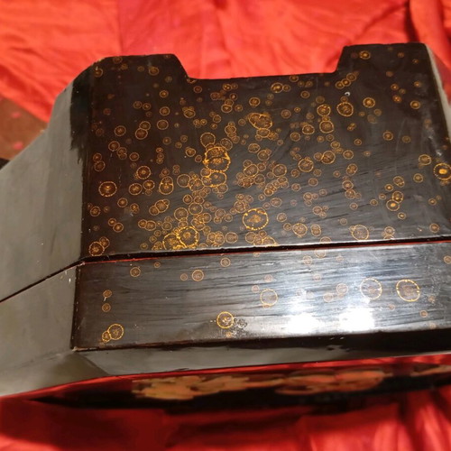 Wooden octagonal box used with shell decoration and red lacquer interior