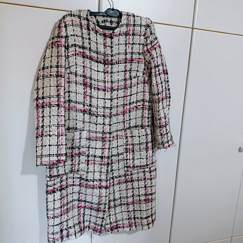 Coat used, no collar, fastens with studs, size M, white multicolor