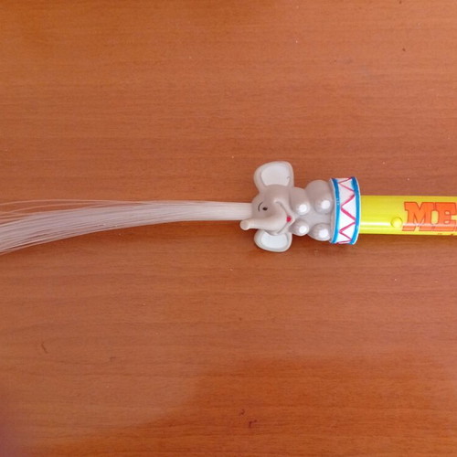 Vintage children's fiber optic wand with elephant figure from Medrano circus