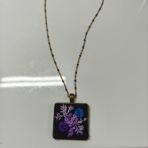 Necklace with embroidery, like new, purple flowers and gold steel chain