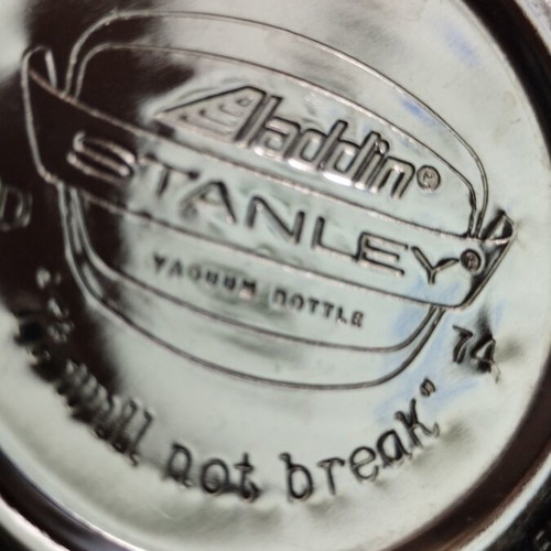 Vintage Stanley Alladin thermos with leather case used