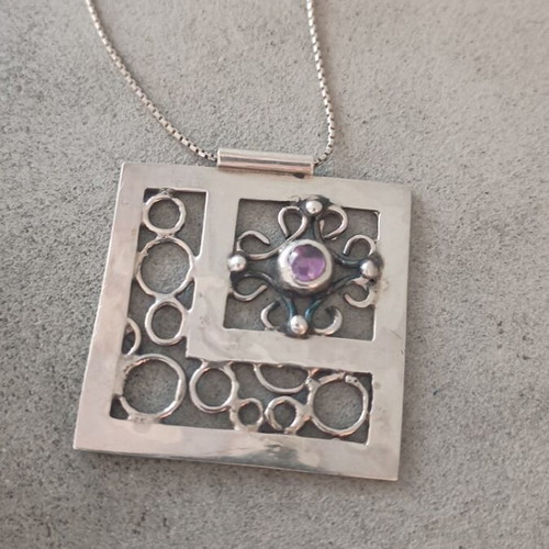 Silver handmade pendant used without hallmark