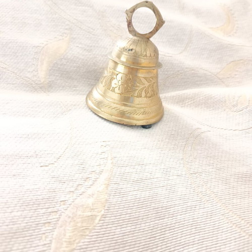 Bronze bell used with traditional engraved floral motifs