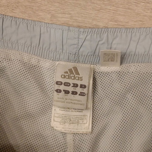 Adidas vintage track pants ice blue with white stripes, used