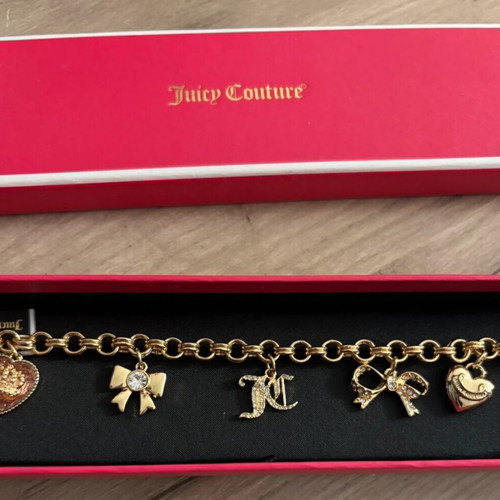 Juicy Couture bracelet with charms, like new, gold tone