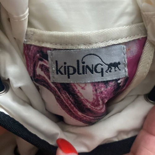 Kipling backpack white like new with black details