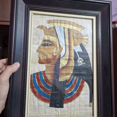 Old papyrus in frame with Pharaoh design like new