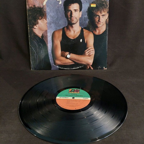 Saga Wildest Dreams vinyl used, rock with insert X8