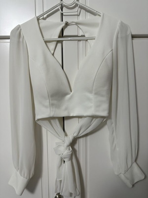 White women's blouse with back tie and transparent sleeves like new