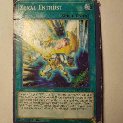 Zexal Entrust Yu-Gi-Oh card slightly used