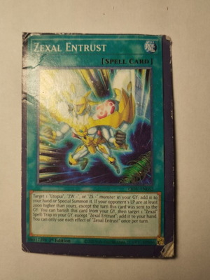Zexal Entrust Yu-Gi-Oh card slightly used