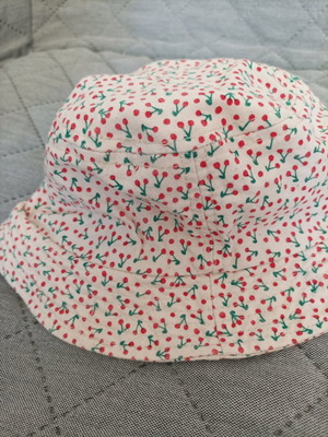 Children's hat like new with cherry pattern