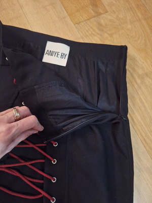 Mini skirt Aniye By like new, size S 36, black and red