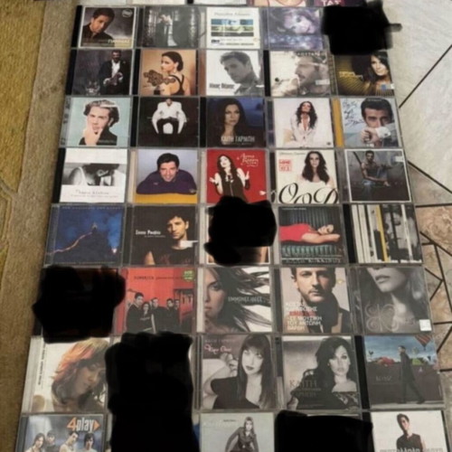 Collection of authentic CDs by Greek and international artists