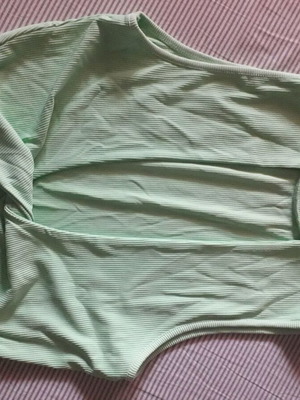 Top ribbed elastic with open back like new