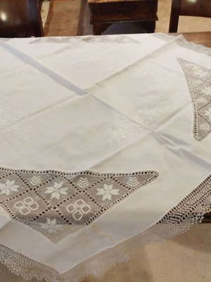 Handmade tablecloth used with crocheted details