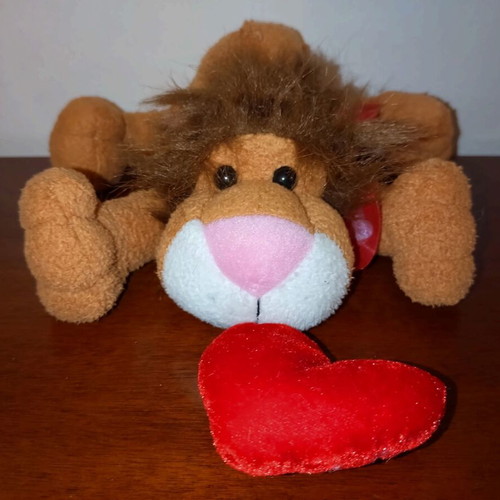 Plush lion cub used stuffed toy