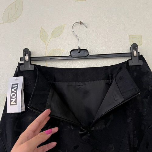 A-Style black skirt with floral pattern and satin detail, new