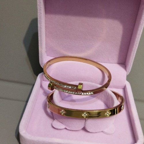 Hinged bracelet handcuffs new, gold-plated steel, set of 2