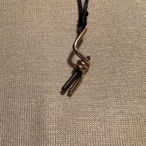 Handmade long steel pendant in gold and black like new