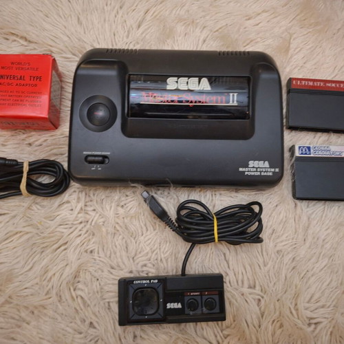 Sega Master System II used with 2 cartridges and new power supply