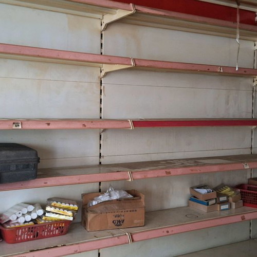 Professional shelving used with display cabinets