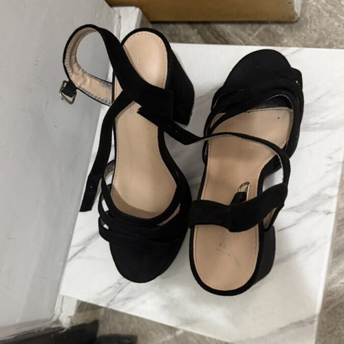 Black sandals used, 10 cm heel, size 37