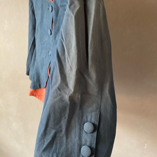 Vintage two-tone jacket like new, faded on one sleeve