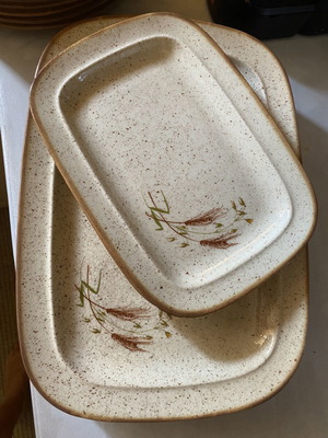 Dinnerware set like new from Poland with 6 large plates, 4 soup plates, 5 platters
