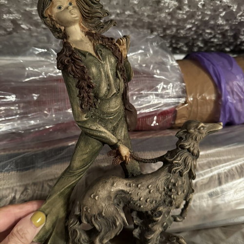 Vintage figurine girl with dog like new