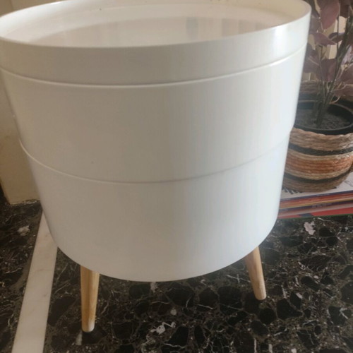 Side table used, round with storage